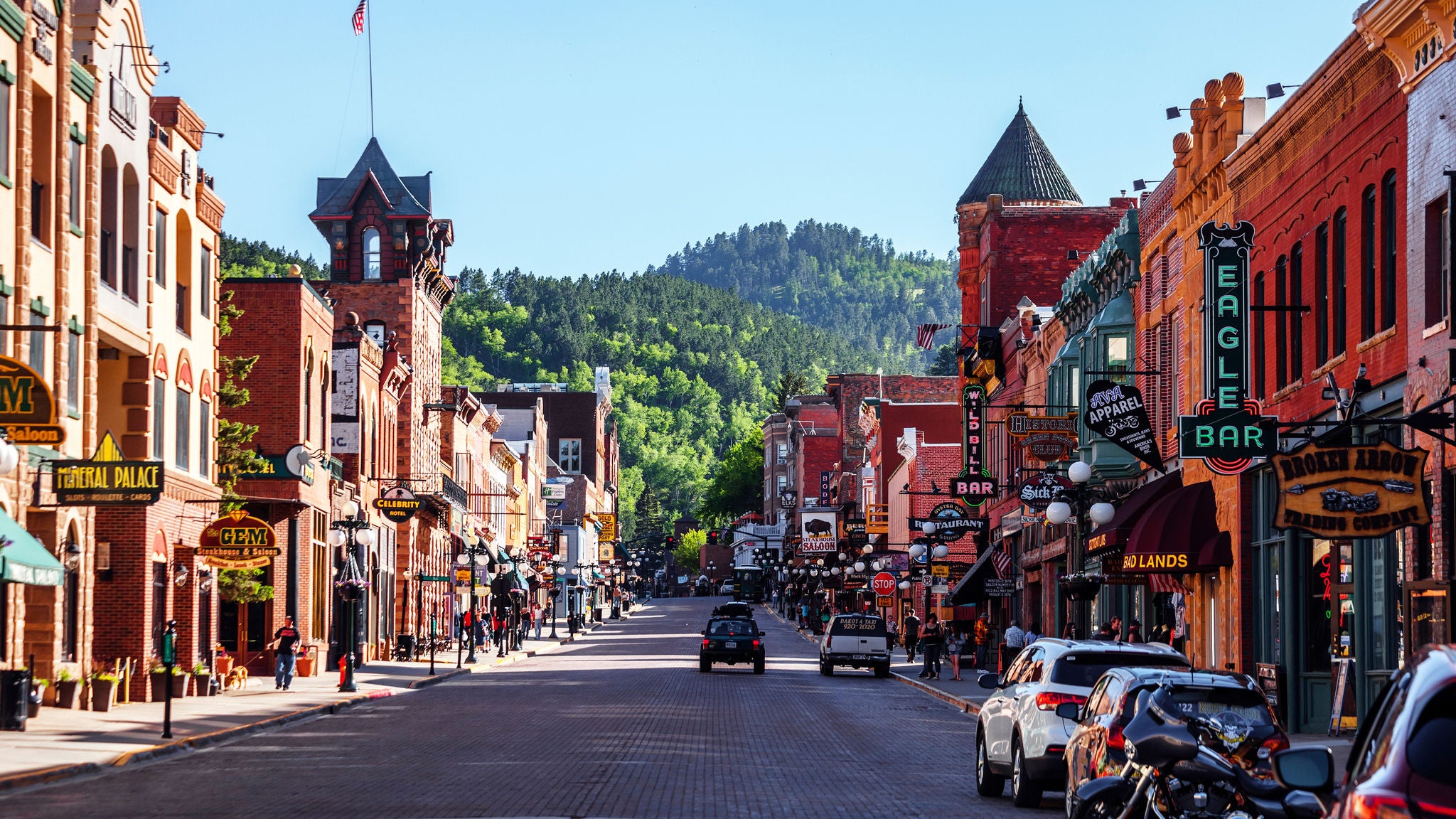 Main Street scene main street with green mountain behind